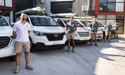 Emergency Electrician Sydney | Olympic Electrical Emergency Electrician Sydney working on outdoor electrical wiring with tools and equipment